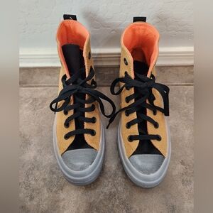 Converse High-Top Sneakers with Orange and Black Accents